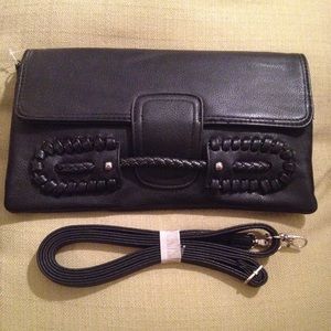 Black faux leather handbag